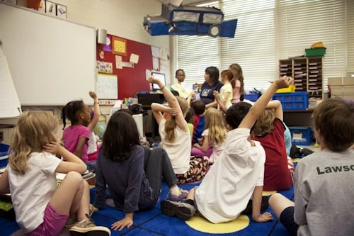 Students presenting science projects at a school fair