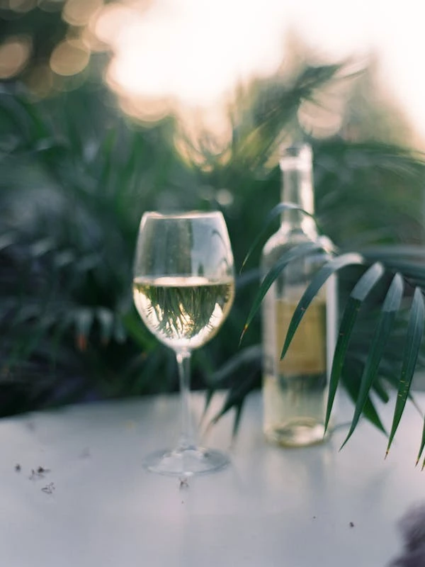 White wine poured into a crystal glass