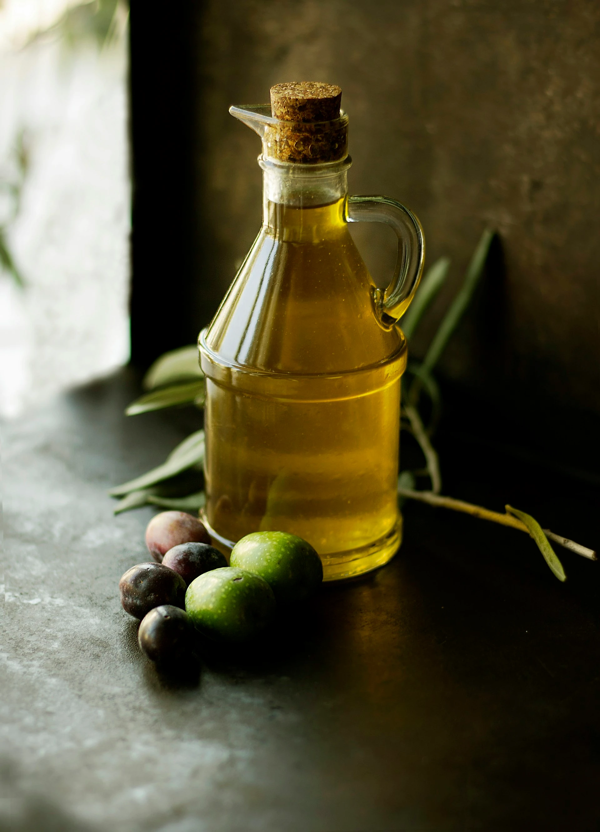 Golden extra-virgin olive oil being poured