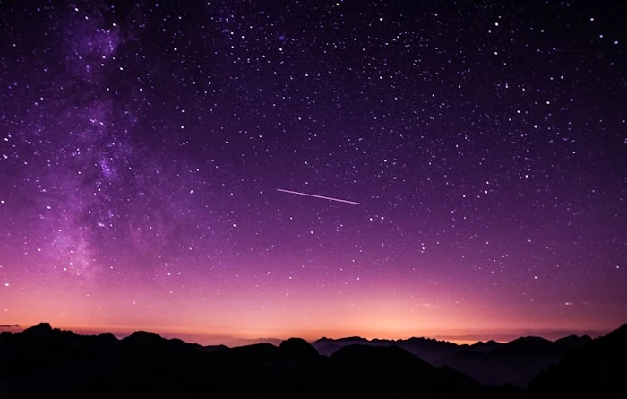 Stargazing on a private beach at night