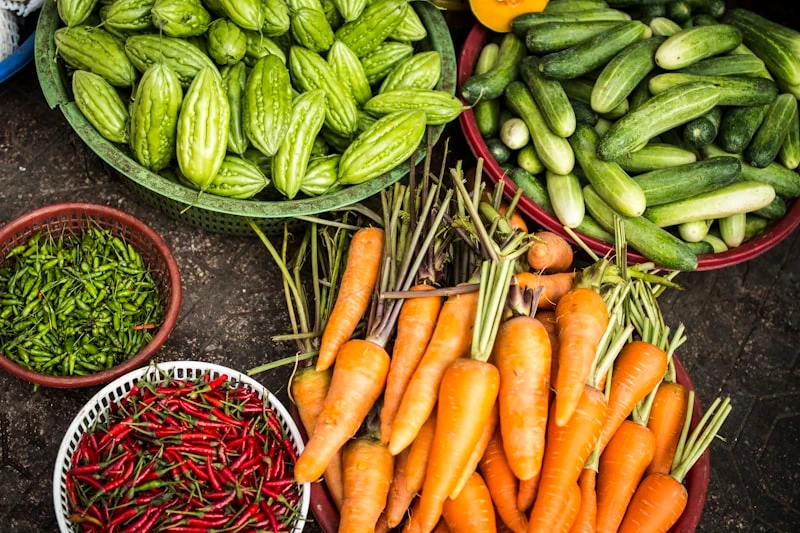 A vibrant farmers' market with produce from GreenHarvest-supported cooperatives
