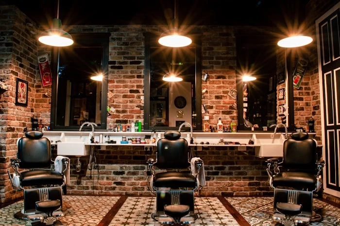 Classic barbershop interior with leather chairs and mirrors