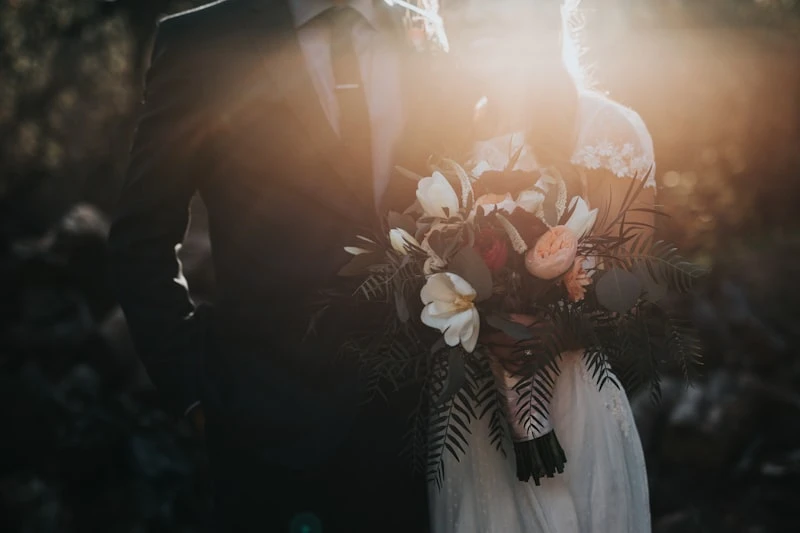 Dilini on her wedding day — soft light, floral bouquet